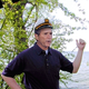 Bush stands before the canoe he claims was treed by a group of mischievous Gore campers.
